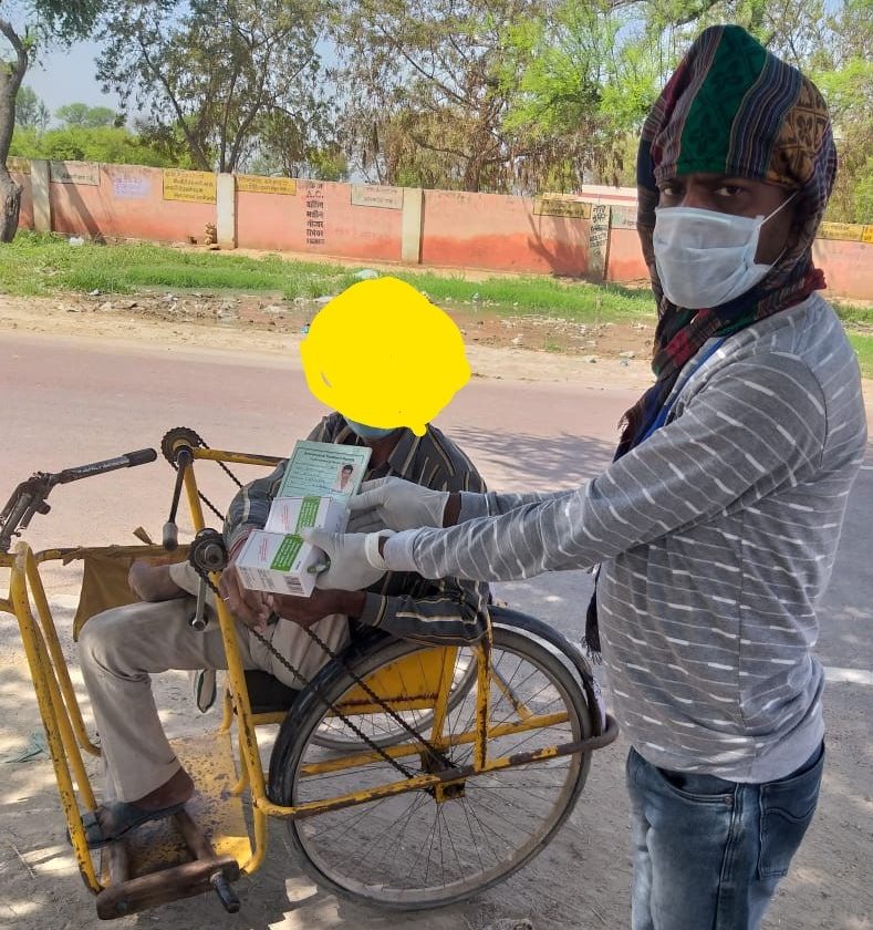 PLHIV community member being provided with ART medication