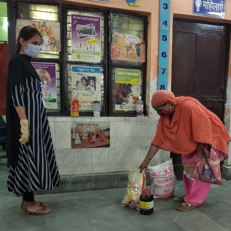 Ration being distributed to the community member